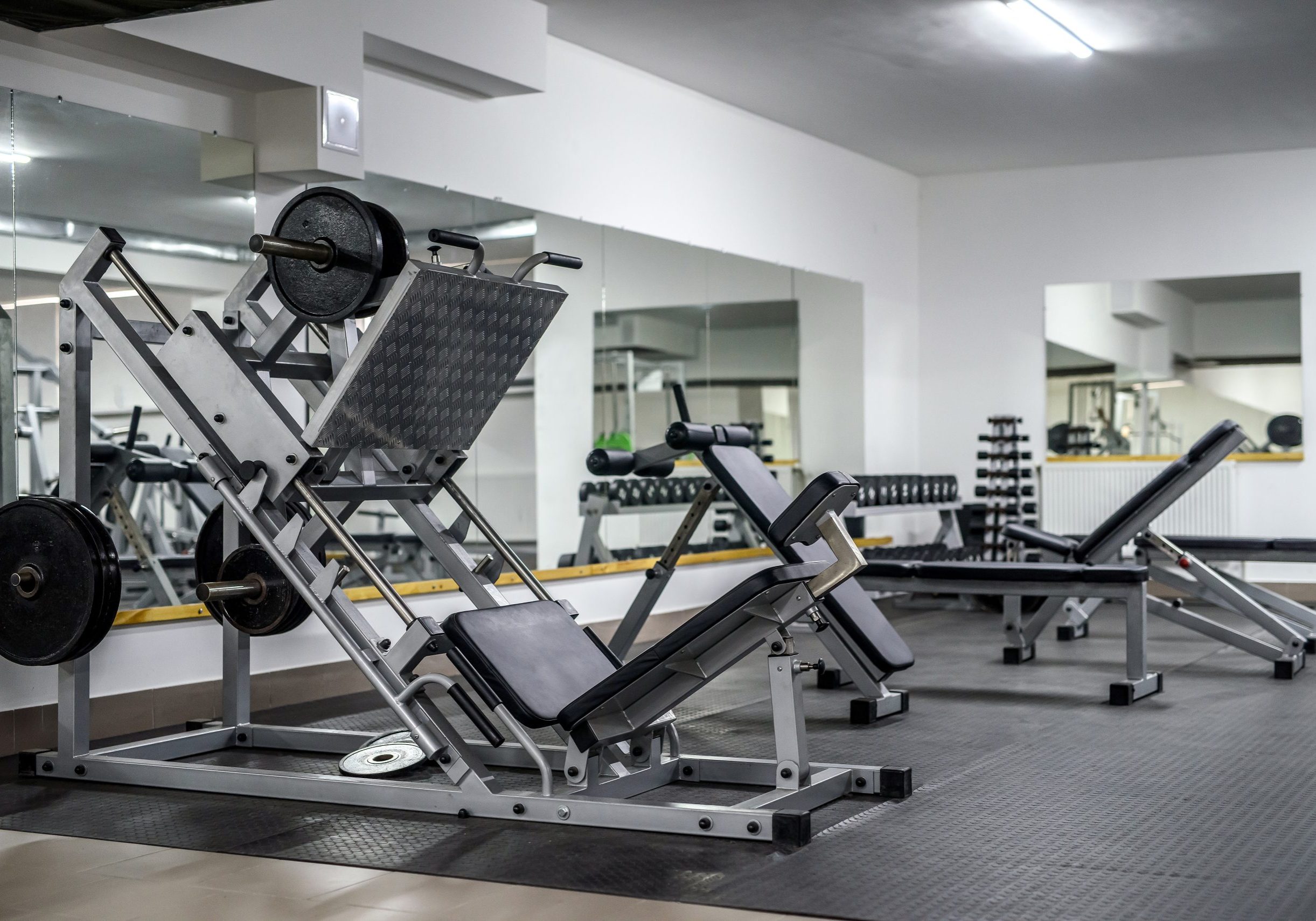 Modern and empty gym interior with equipment Modern and empty gym interior with equipment